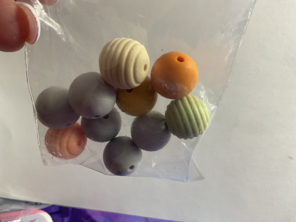 $3.00 Bags Of 14/16mm Silicone Beads