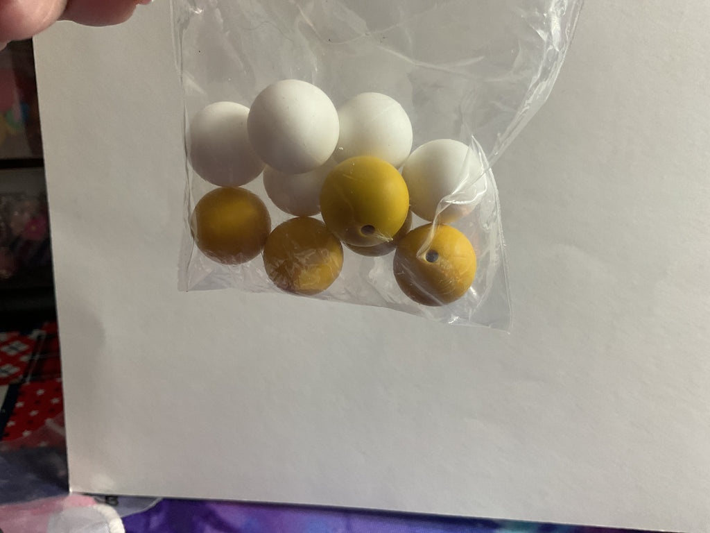 $3.00 Bags Of 14/16mm Silicone Beads