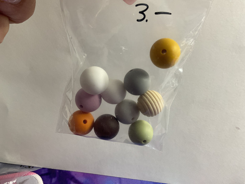 $3.00 Bags Of 14/16mm Silicone Beads
